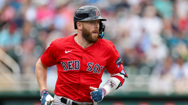 Mar 6, 2024; Fort Myers, Florida, USA; Boston Red Sox shortstop Trevor Story (10) singles against the Minnesota Twins in the sixth inning at Hammond Stadium.